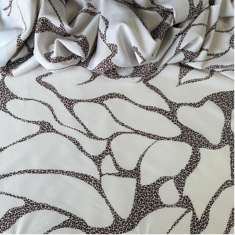 Tecido Estampado Viscoseda Onças Abstratas